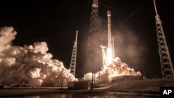 This Jan. 7, 2019 photo made available by SpaceX shows the launch of the Falcon 9 rocket at Cape Canaveral, Fla., for the "Zuma" U.S. satellite mission. 