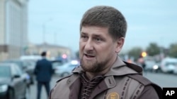 FILE - Chechen leader Ramzan Kadyrov talks to the press in the Chechen regional capital, Grozny.