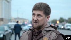 Chechen leader Ramzan Kadyrov talks to the press in the Chechen regional capital, Grozny, Oct. 5, 2014.