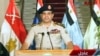 Egyptian army chief Abdel Fattah al-Sisi delivers a statement as the army unveils a roadmap for Egypt's political future, July 3, 2013. (AFP/Egyptian TV) 