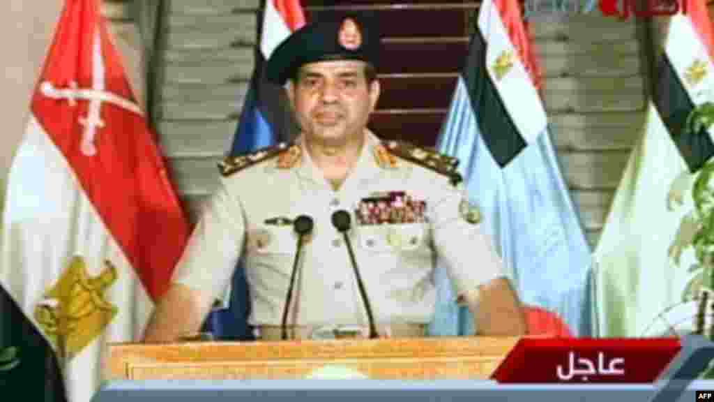 Egyptian Defense Minister Abdelfatah al-Sissi delivering a statement as the army unveils a roadmap for Egypt&#39;s political future, July 3, 2013. (Egyptian TV photo) 