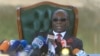 Former Zimbabwean President Robert Mugabe holds a press briefing at his residence in Harare, July 29, 2018, on the eve of the country's elections. 