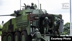 台湾汉光演习CM34甲车搭载宪兵准备下车战斗，扫荡突入敌特攻人员。（台湾国防部提供）