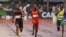  Tyson Gay (izquierda) fue prohibido de competir el año pasado.
