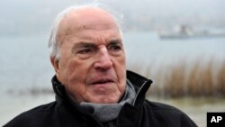 FILE - Former German chancellor Helmut Kohl on the shore of Lake Tegernsee in Bad Wiessee, southern Germany, April 5, 2013.