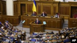 Ukrainian President Petro Poroshenko speaks during a parliament session in Kyiv, Ukraine, Nov. 26, 2018.