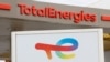 FILE - TotalEnergies signs at a petrol station in Nice, France, on Oct. 10, 2022. The human rights and environmental group Global Witness accused the company this week of intimidation tactics by its East African Crude Oil Pipeline project. TotalEnergies has denied the allegation.