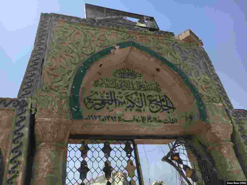 Much of the Old City of Mosul is in ruins as Iraqi forces battle Islamic State militants for the city. The gate to the entrance of the destroyed al-Nuri mosque was left standing, July 1, 2017.