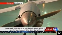 Imagen tomada de la televisión iraní que muestran lo que el gobierno de Teherán asegura es un avión no tripulado ScanEagle de Estados Unidos, el cual fue capturado en territorio israelí.