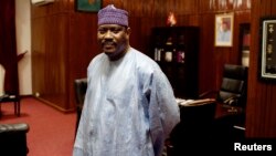 FILE - Former Prime Minister Hama Amadou poses for a picture at his office in the National Assembly in Niamey, Niger, Sept. 16, 2013. 