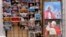 Postcards and calendars are displayed outside a shop at the Vatican, February 12, 2013.
