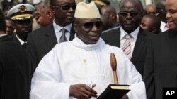 Gambian President Yahya Jammeh stands outside the Sipopo Conference Center ahead of the opening session of the 17th African Union Summit, in Malabo, Equatorial Guinea, June 2011. 