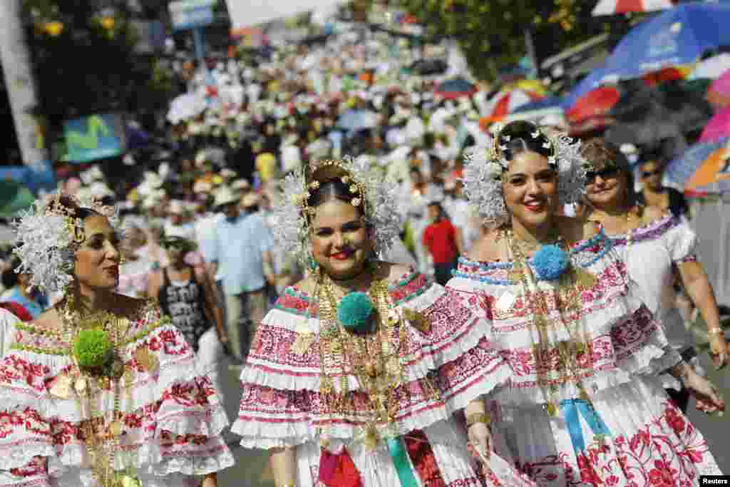 Women wearing traditional clothing known as &quot;Pollera&quot; take part in the annual Thousand Polleras parade in Las Tablas, in the province of Los Santos, Panama, Jan. 10, 2015.