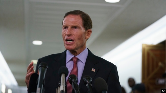 FILE - Senator Richard Blumenthal talks to media on Capitol Hill in Washington, Sept. 28, 2018.