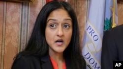 FILE - Vanita Gupta, then the head of Justice Department's Civil Rights Division, speaks in Cleveland, May 26, 2015.