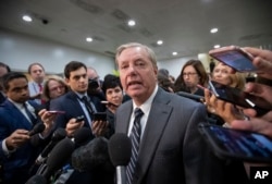 Sen. Lindsey Graham speaks to reporters after a closed-door security briefing by CIA Director Gina Haspel on the slaying of Saudi journalist Jamal Khashoggi and involvement of the Saudi crown prince, Mohammed bin Salman, at the Capitol in Washington, Dec. 4, 2018.