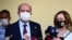 Ersin Tatar candidate and prime minister of a self-declared Turkish Cypriot state recognized only by Turkey with his wife Sibel Tatar speak to the media in the Turkish occupied area in the north part of the divided capital Nicosia, Oct. 18, 2020.
