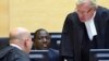 Kenyan Deputy President William Ruto (C) sits in the courtroom of the International Criminal Court in The Hague, May 14, 2013.