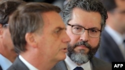 Brazilian President-elect Jair Bolsonaro, left, and his newly appointed Foreign Minister, Brazilian diplomat Ernesto Araujo, are pictured in Brasilia, on Nov. 14, 2018.