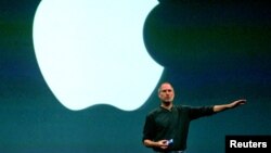 FILE - Then Apple CEO, Steve Jobs, speaks in London during the launch of the European iTunes online music store in this June 15, 2004, photo. 