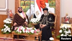 Pope Tawadros II, head of the Egyptian Coptic Orthodox Church, receives Saudi Crown Prince Mohammad Bin Salman in Cairo, March 5, 2018, in this picture courtesy of the Egyptian Presidency. 