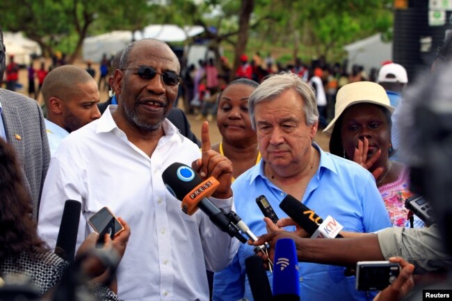 FILE - UN Secretary General Antonio Guterres (L) and Uganda's Prime Minister Ruhakana Rugunda address the media after a tour of Imvepi, where south Sudanese refugees are settled, in northern Uganda, June 22, 2017.