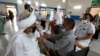 WHO Approves Chinese-Made COVID Vaccine for Emergency Use 