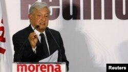 Leftist front-runner Andres Manuel Lopez Obrador, presidential pre-candidate of the National Regeneration Movement (MORENA), addresses supporters during an event to present new campaign officials in Mexico City, Mexico, Feb. 1, 2018. 