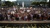 People take part in a protest against the use of protective masks amid the coronavirus pandemic, in Madrid, Spain, Aug. 16, 2020.