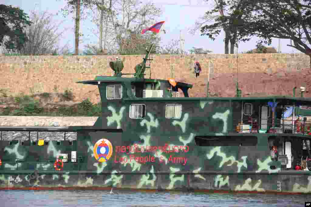 A Lao military boat moored at a special economic zone on the Mekong River. (VOA - D. Schearf)