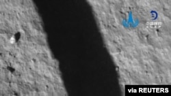 An image taken by the Chang'e 5 spacecraft after its landing on the moon is seen in this handout provided by China National Space Administration.