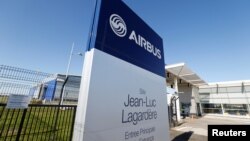 A logo of Airbus is seen at the entrance of the Airbus A380 final assembly line site at Airbus headquarters in Blagnac, near Toulouse, France February 14, 2019. The WTO recently ruled in a case over government subsidies to Airbus. (REUTERS/Regis Duvignau)