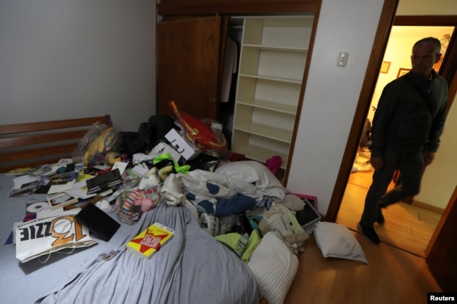 Personal belongings are seen on the floor at the residence of Roberto Marrero, chief of staff to opposition leader Juan Guaido, after he was detained by Venezuelan intelligence agents, according to legislators, in Caracas, Venezuela, March 21, 2019.