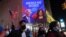People celebrate media announcing that Democratic U.S. presidential nominee Joe Biden has won the 2020 U.S. presidential election, at Times Square in New York City, U.S. November 7, 2020. REUTERS/Jeenah Moon