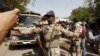 A Pakistan Ranger gestures to stop members of the media from taking pictures at an anti-terrorism court in Karachi, Pakistan, March 12, 2015. Since the military courts were reinstated in 2015, verdicts have been issued in more than 300 terrorism-related c