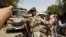 A Pakistan Ranger gestures to stop members of the media from taking pictures at an anti-terrorism court in Karachi, Pakistan, March 12, 2015. Since the military courts were reinstated in 2015, verdicts have been issued in more than 300 terrorism-related c