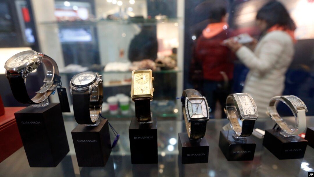 Visitors walk around near the products that were made at Kaesong Industrial Complex in North Korea at its showroom at the unification observatory in Paju, South Korea, Feb. 10, 2016.