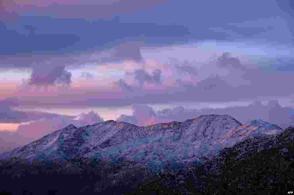 Snow blankets the Angeles National Forest north of Los Angeles, California, Dec. 26, 2019. 