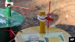 Sealed ballot boxes are seen after closure of the polling station in Serrekunda during the presidential elections, November 24, 2011