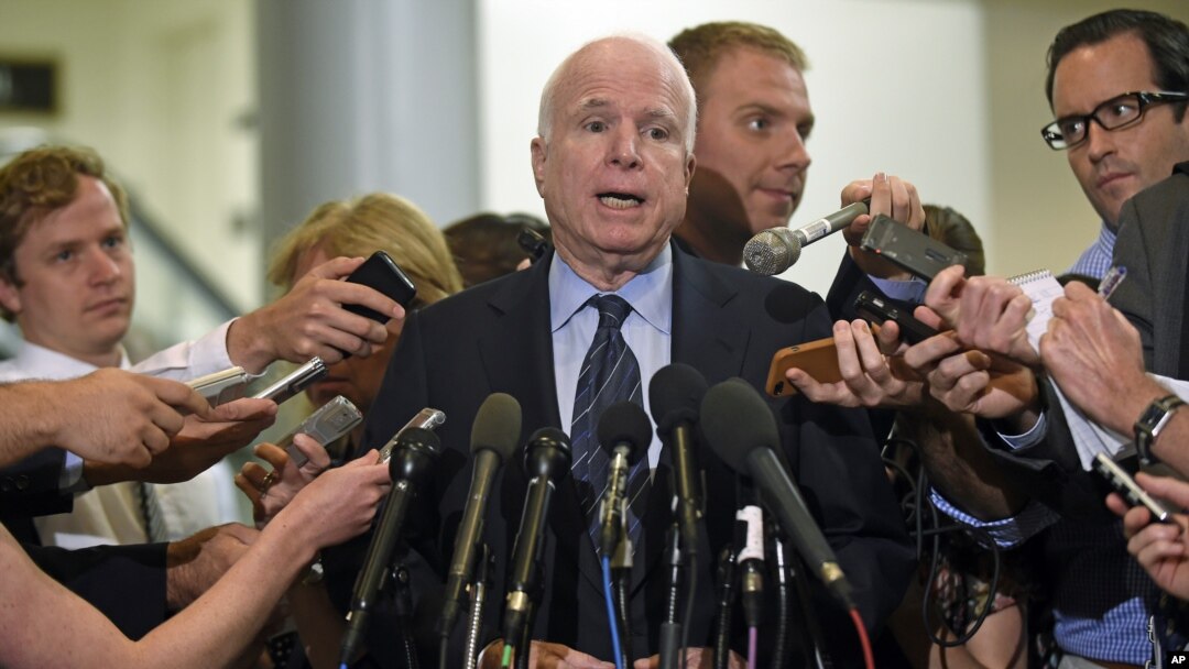 Senate Armed Service Committee member Sen. John McCain, speaks to reporters on Capitol Hill, July 8, 2014.