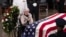 Roberta McCain, the mother of Sen. John McCain of Arizona, stops at his flag-draped casket in the U.S. Capitol rotunda during a farewell ceremony, Aug. 31, 2018, in Washington.