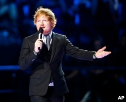 FILE - British singer Ed Sheeran at the MTV European Music Awards in Milan, Italy.