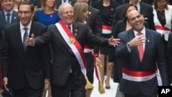 Peru's President Pedro Pablo Kuczynski, center, walks with Prime Minister Fernando Zavala, right, and first Vice President Martin Vizcarra, left, to Congress in Lima, Peru, July 28, 2017. Kuczynski delivered his first State of the Nation address to Congr