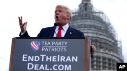 FILE - Donald Trump, then a Republican presidential candidate, speaks at a rally organized by Tea Party Patriots in on Capitol Hill in Washington, Sept. 9, 2015, to oppose the Iran nuclear agreement.