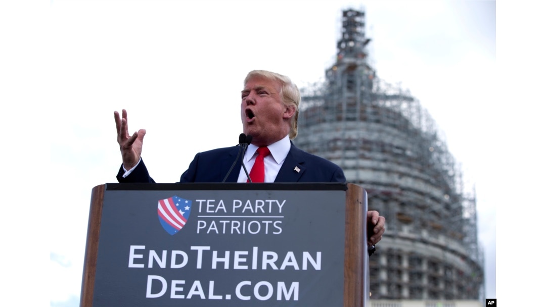 FILE - Then-Republican presidential candidate Donald Trump speaks at a rally to oppose the Iran nuclear agreement on Capitol Hill in Washington, Sept. 9, 2015.