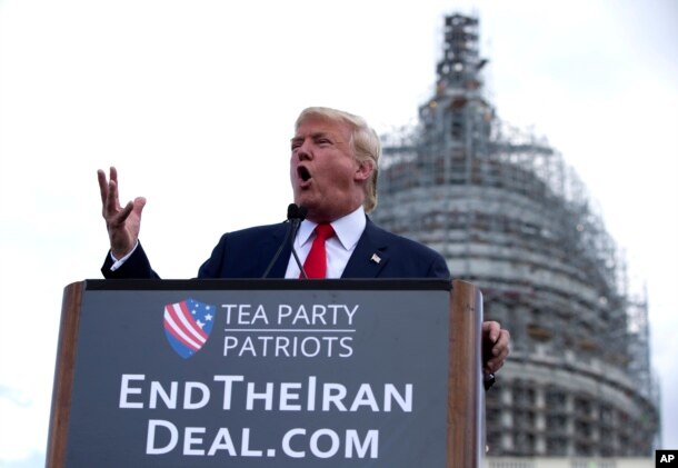 FILE - Republican presidential candidate Donald Trump speaks at a rally organized by Tea Party Patriots in on Capitol Hill in Washington, Sept. 9, 2015, to oppose the Iran nuclear agreement.