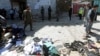 Clothes and shoes are seen at the site of a suicide bomb attack in Kabul, Afghanistan, April 22, 2018.