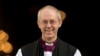 The new Archbishop of Canterbury, Justin Welby, walks outside St Paul's Cathedral as he poses for the media following his ceremony known as the confirmation of election in London, February 4, 2013.