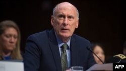 FILE - Director of National Intelligence Dan Coats testifies on worldwide threats during a Senate Intelligence Committee hearing on Capitol Hill in Washington, Feb. 13, 2018.