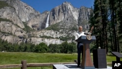President Barack Obama speaks by the Sentinel Bridge, in front of the Yosemite Falls, the highest waterfall in Yosemite National Park, California, June 18, 2016.